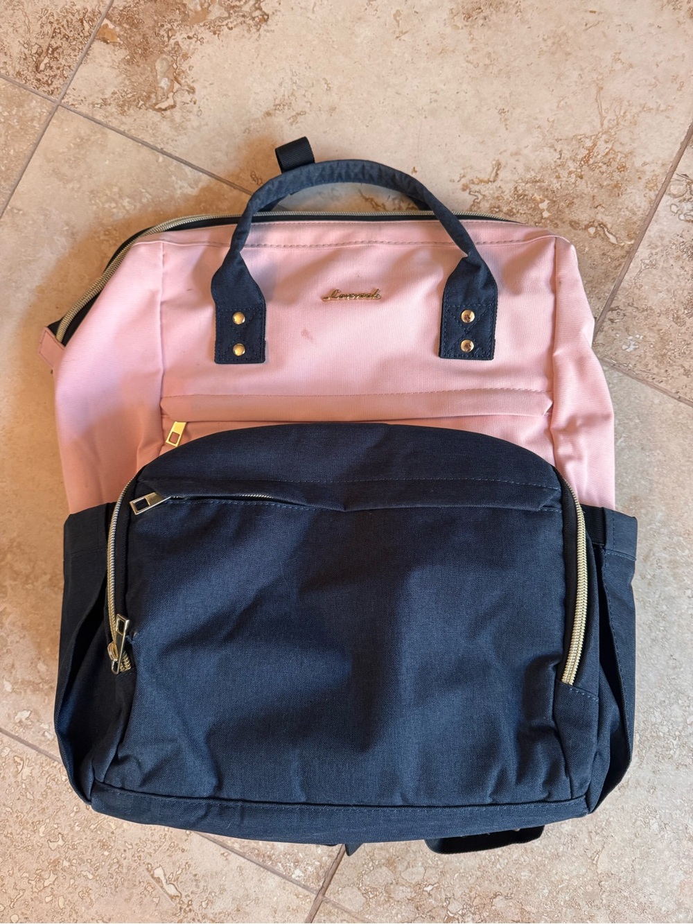 Pink and navy laptop backpack